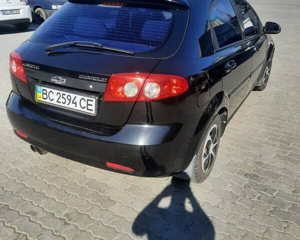 Черный Шевроле Лачетти, объемом двигателя 1.6 л и пробегом 220 тыс. км за 2000 $, фото 1 на Automoto.ua