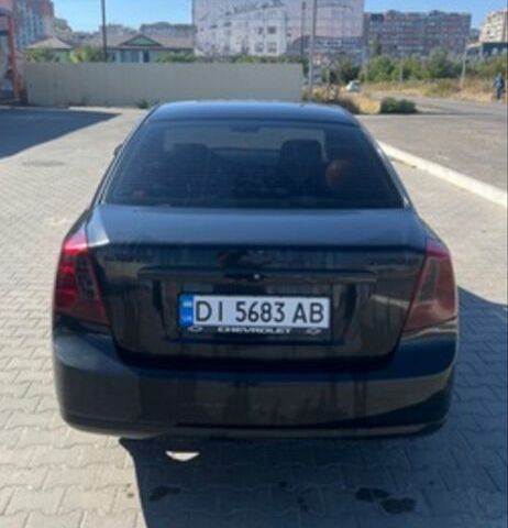 Черный Шевроле Лачетти, объемом двигателя 1.8 л и пробегом 220 тыс. км за 3200 $, фото 1 на Automoto.ua