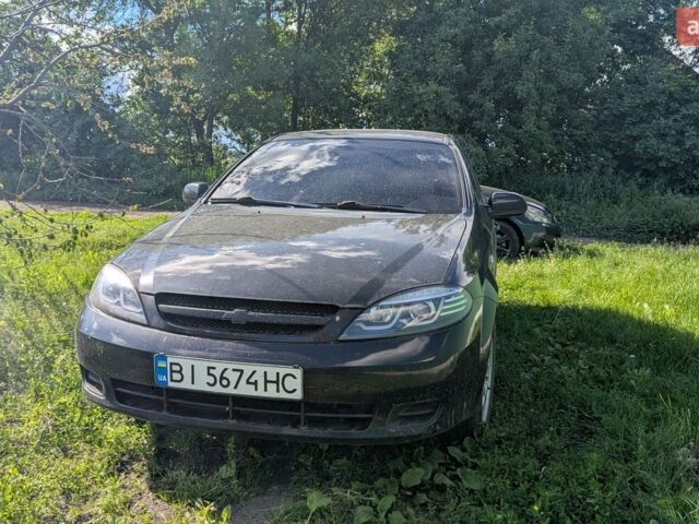 Черный Шевроле Лачетти, объемом двигателя 1.6 л и пробегом 300 тыс. км за 4300 $, фото 1 на Automoto.ua