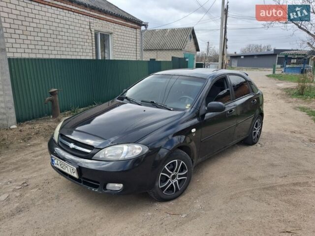 Черный Шевроле Лачетти, объемом двигателя 1.6 л и пробегом 300 тыс. км за 3000 $, фото 1 на Automoto.ua