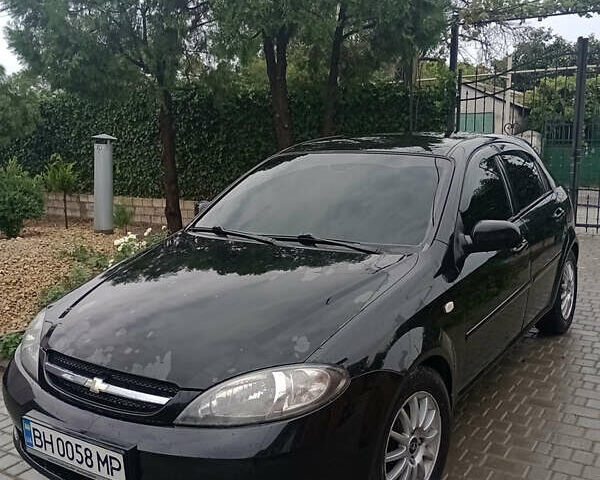 Черный Шевроле Лачетти, объемом двигателя 1.8 л и пробегом 160 тыс. км за 5200 $, фото 1 на Automoto.ua