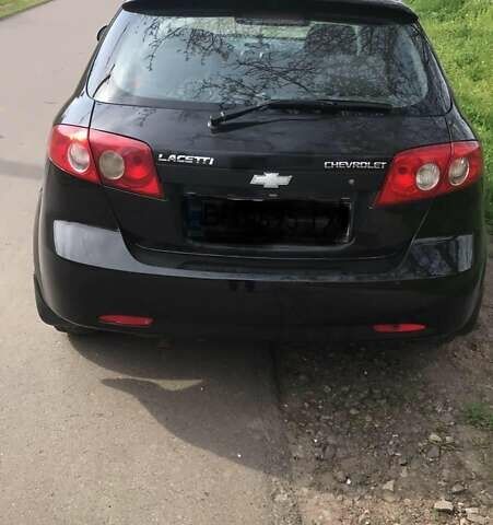 Черный Шевроле Лачетти, объемом двигателя 1.6 л и пробегом 236 тыс. км за 4000 $, фото 1 на Automoto.ua