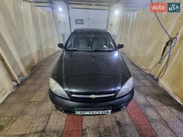 Черный Шевроле Лачетти, объемом двигателя 1.6 л и пробегом 229 тыс. км за 4200 $, фото 1 на Automoto.ua