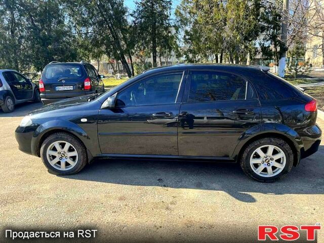 Черный Шевроле Лачетти, объемом двигателя 1.6 л и пробегом 1410 тыс. км за 4600 $, фото 1 на Automoto.ua