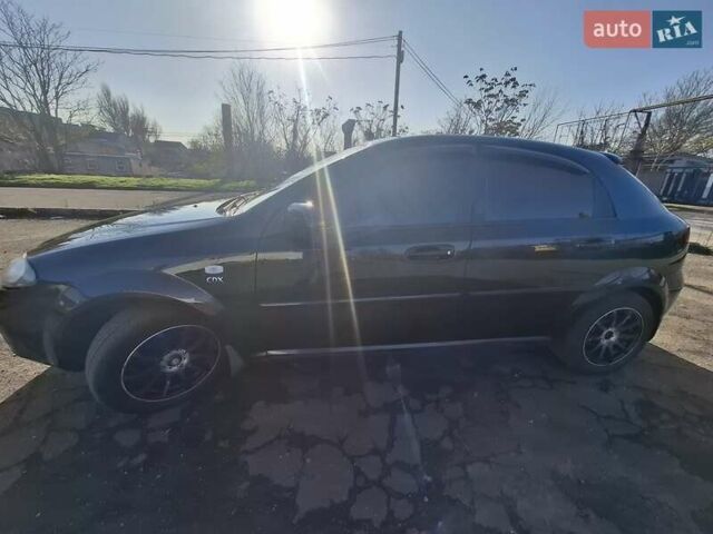 Черный Шевроле Лачетти, объемом двигателя 1.8 л и пробегом 136 тыс. км за 4800 $, фото 1 на Automoto.ua