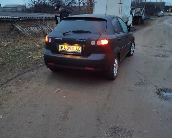 Черный Шевроле Лачетти, объемом двигателя 1.8 л и пробегом 163 тыс. км за 5000 $, фото 1 на Automoto.ua