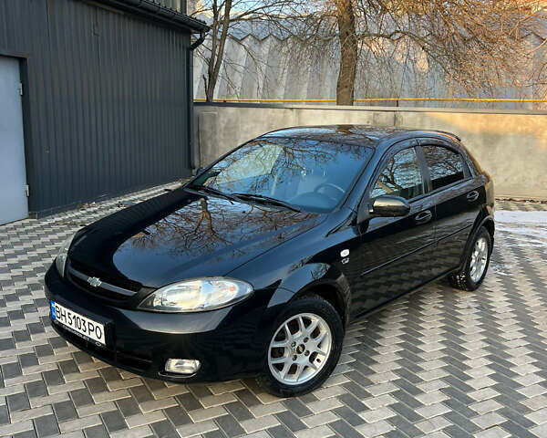 Черный Шевроле Лачетти, объемом двигателя 1.8 л и пробегом 84 тыс. км за 6500 $, фото 1 на Automoto.ua