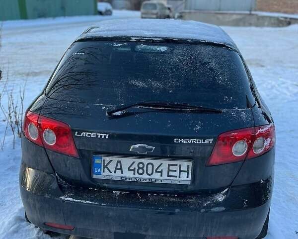 Черный Шевроле Лачетти, объемом двигателя 1.6 л и пробегом 225 тыс. км за 2000 $, фото 1 на Automoto.ua