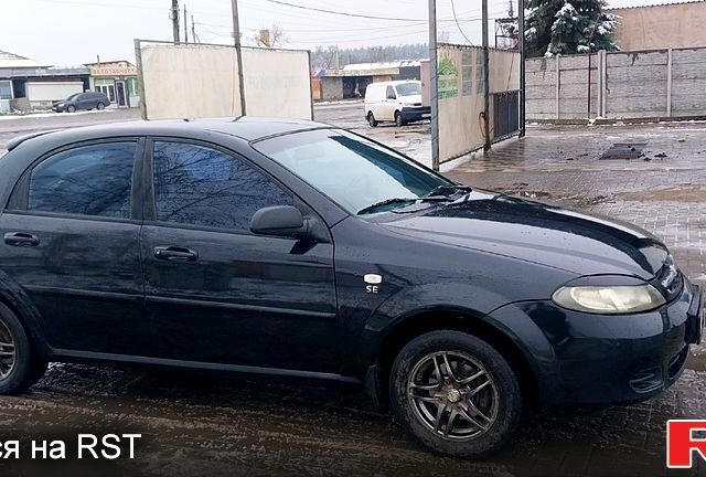 Черный Шевроле Лачетти, объемом двигателя 1.6 л и пробегом 390 тыс. км за 4200 $, фото 1 на Automoto.ua