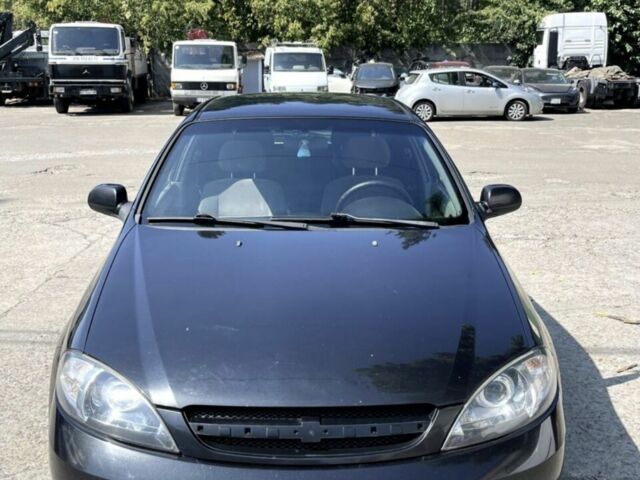 Черный Шевроле Лачетти, объемом двигателя 1.6 л и пробегом 325 тыс. км за 4500 $, фото 1 на Automoto.ua