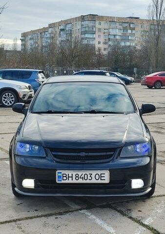 Черный Шевроле Лачетти, объемом двигателя 1.8 л и пробегом 278 тыс. км за 2999 $, фото 1 на Automoto.ua