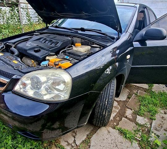 Черный Шевроле Лачетти, объемом двигателя 1.6 л и пробегом 264 тыс. км за 4300 $, фото 1 на Automoto.ua