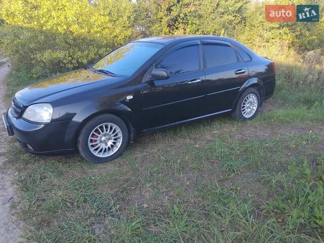 Черный Шевроле Лачетти, объемом двигателя 1.6 л и пробегом 240 тыс. км за 3800 $, фото 1 на Automoto.ua
