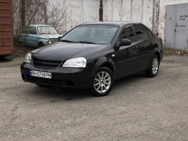 Черный Шевроле Лачетти, объемом двигателя 1.6 л и пробегом 400 тыс. км за 2000 $, фото 1 на Automoto.ua