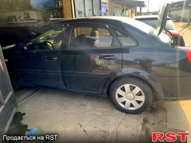 Черный Шевроле Лачетти, объемом двигателя 1.6 л и пробегом 200 тыс. км за 3888 $, фото 1 на Automoto.ua