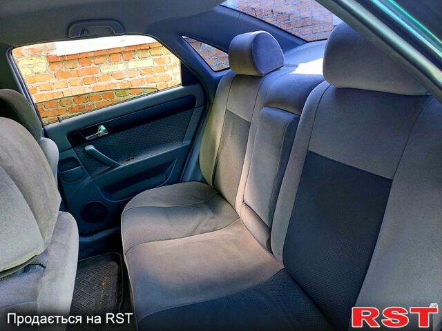 Черный Шевроле Лачетти, объемом двигателя 1.8 л и пробегом 105 тыс. км за 4500 $, фото 1 на Automoto.ua