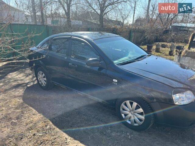 Черный Шевроле Лачетти, объемом двигателя 1.8 л и пробегом 320 тыс. км за 3000 $, фото 1 на Automoto.ua