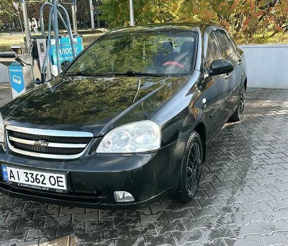 Черный Шевроле Лачетти, объемом двигателя 1.6 л и пробегом 359 тыс. км за 3500 $, фото 1 на Automoto.ua