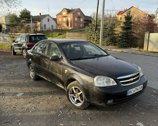 Черный Шевроле Лачетти, объемом двигателя 1.6 л и пробегом 180 тыс. км за 2200 $, фото 1 на Automoto.ua