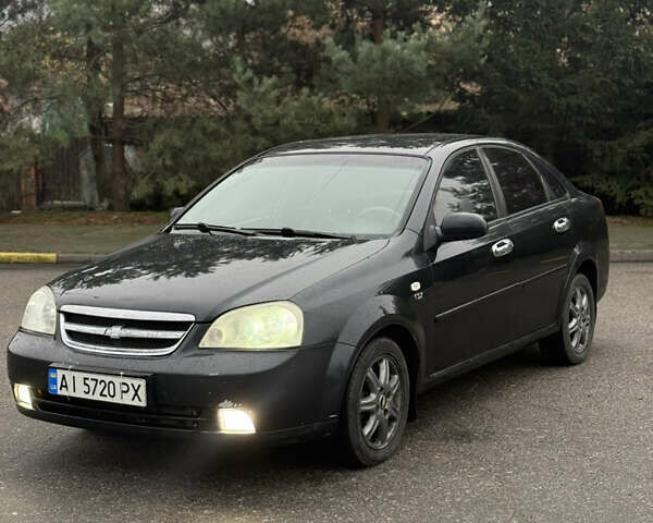 Черный Шевроле Лачетти, объемом двигателя 1.8 л и пробегом 230 тыс. км за 3200 $, фото 1 на Automoto.ua