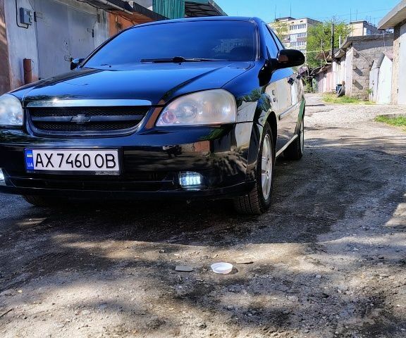 Черный Шевроле Лачетти, объемом двигателя 1.8 л и пробегом 232 тыс. км за 4000 $, фото 1 на Automoto.ua