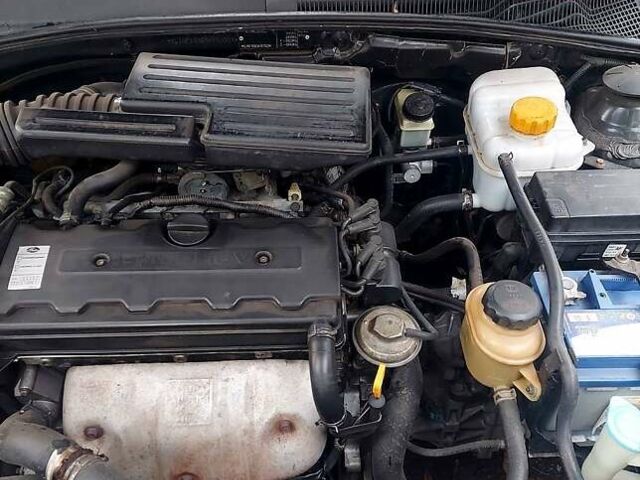 Черный Шевроле Лачетти, объемом двигателя 1.8 л и пробегом 203 тыс. км за 3800 $, фото 1 на Automoto.ua