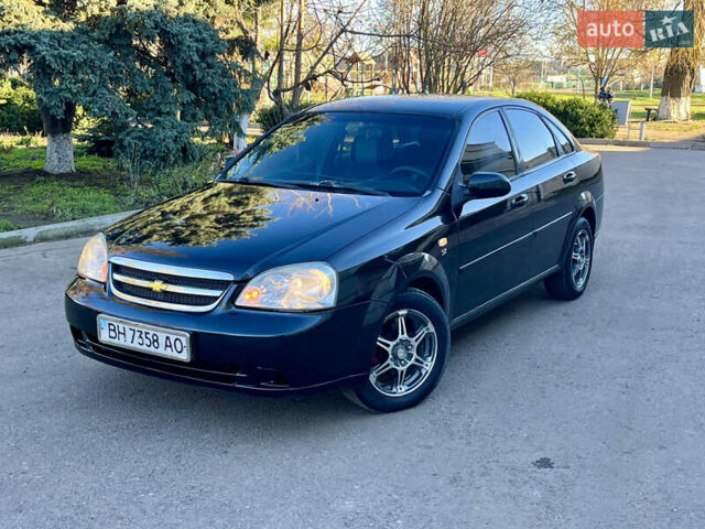 Черный Шевроле Лачетти, объемом двигателя 1.8 л и пробегом 198 тыс. км за 3600 $, фото 1 на Automoto.ua