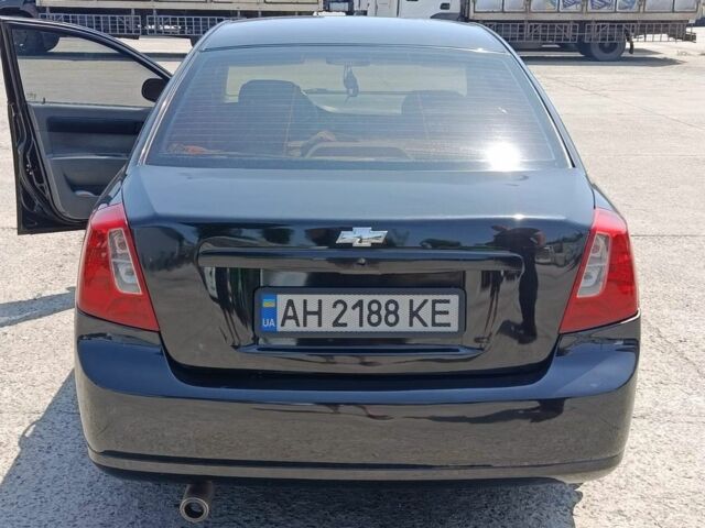 Чорний Шевроле Лачетті, об'ємом двигуна 1.6 л та пробігом 255 тис. км за 3699 $, фото 1 на Automoto.ua