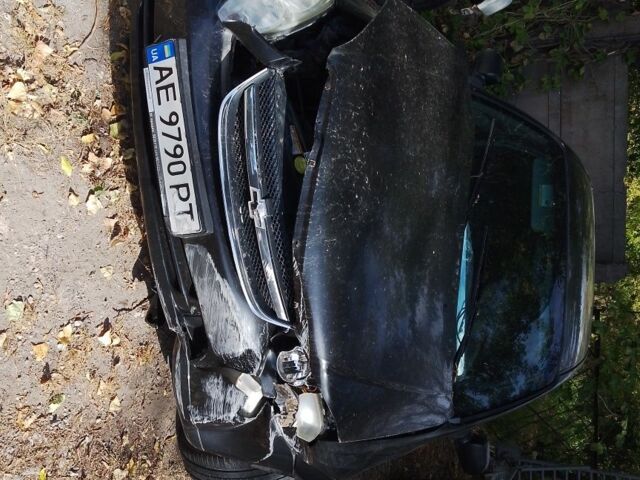 Черный Шевроле Лачетти, объемом двигателя 1.6 л и пробегом 240 тыс. км за 1047 $, фото 1 на Automoto.ua