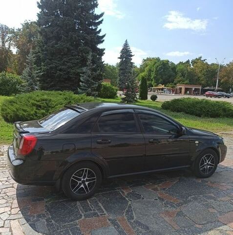 Черный Шевроле Лачетти, объемом двигателя 1.6 л и пробегом 200 тыс. км за 4300 $, фото 1 на Automoto.ua