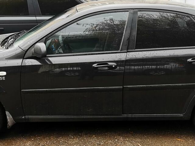 Черный Шевроле Лачетти, объемом двигателя 1.6 л и пробегом 185 тыс. км за 5300 $, фото 1 на Automoto.ua