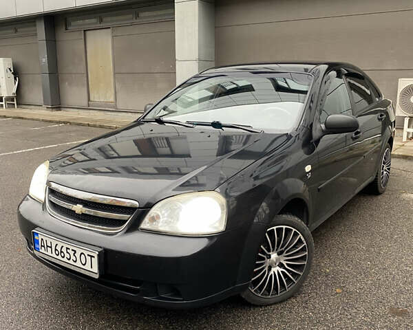 Черный Шевроле Лачетти, объемом двигателя 1.6 л и пробегом 154 тыс. км за 4800 $, фото 1 на Automoto.ua