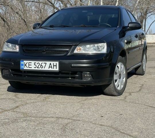 Черный Шевроле Лачетти, объемом двигателя 1.6 л и пробегом 350 тыс. км за 4015 $, фото 1 на Automoto.ua