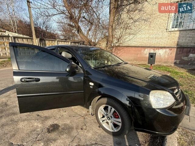 Черный Шевроле Лачетти, объемом двигателя 1.6 л и пробегом 253 тыс. км за 4000 $, фото 1 на Automoto.ua