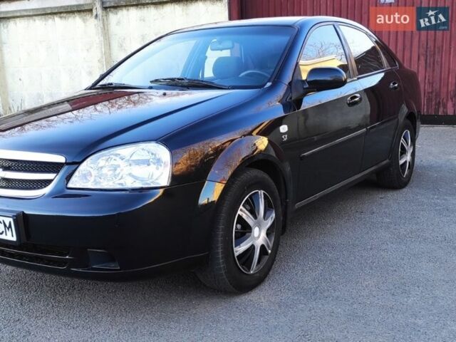 Черный Шевроле Лачетти, объемом двигателя 1.8 л и пробегом 218 тыс. км за 3400 $, фото 1 на Automoto.ua