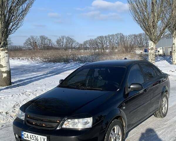 Черный Шевроле Лачетти, объемом двигателя 1.8 л и пробегом 214 тыс. км за 5706 $, фото 1 на Automoto.ua
