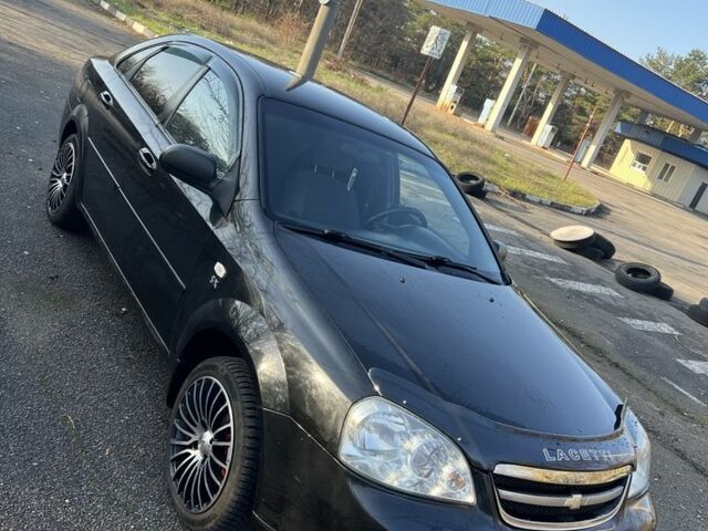 Черный Шевроле Лачетти, объемом двигателя 1.6 л и пробегом 150 тыс. км за 5300 $, фото 1 на Automoto.ua