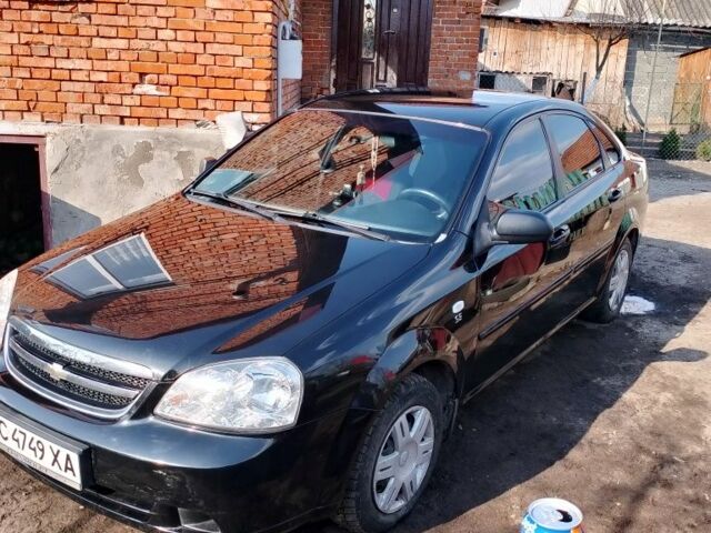 Черный Шевроле Лачетти, объемом двигателя 1.6 л и пробегом 170 тыс. км за 4300 $, фото 1 на Automoto.ua