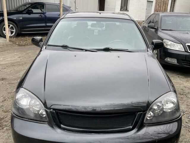 Черный Шевроле Лачетти, объемом двигателя 1.8 л и пробегом 265 тыс. км за 2400 $, фото 1 на Automoto.ua