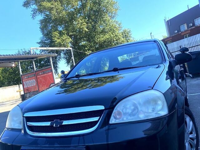 Черный Шевроле Лачетти, объемом двигателя 1.8 л и пробегом 293 тыс. км за 4200 $, фото 1 на Automoto.ua
