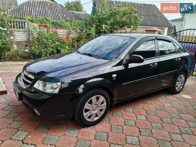Черный Шевроле Лачетти, объемом двигателя 1.8 л и пробегом 270 тыс. км за 4600 $, фото 1 на Automoto.ua