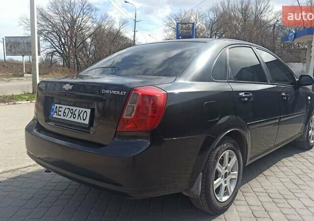 Черный Шевроле Лачетти, объемом двигателя 1.6 л и пробегом 280 тыс. км за 3850 $, фото 1 на Automoto.ua