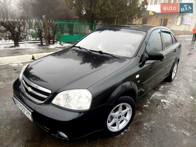 Черный Шевроле Лачетти, объемом двигателя 1.8 л и пробегом 205 тыс. км за 4000 $, фото 1 на Automoto.ua