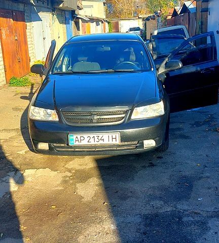 Чорний Шевроле Лачетті, об'ємом двигуна 1.6 л та пробігом 242 тис. км за 4600 $, фото 1 на Automoto.ua