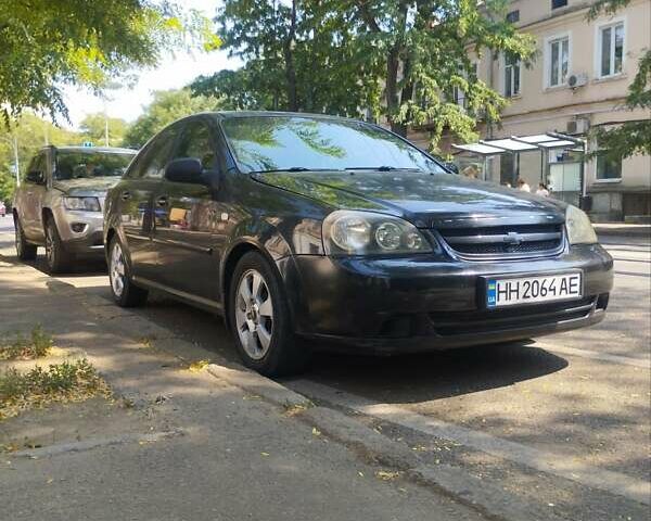 Черный Шевроле Лачетти, объемом двигателя 1.6 л и пробегом 400 тыс. км за 4000 $, фото 1 на Automoto.ua