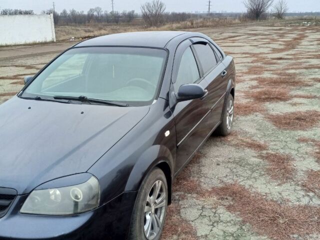 Черный Шевроле Лачетти, объемом двигателя 1.6 л и пробегом 233 тыс. км за 3650 $, фото 1 на Automoto.ua