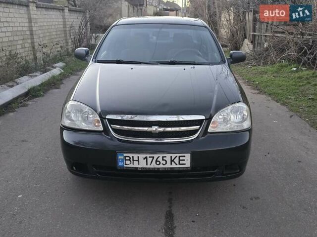 Черный Шевроле Лачетти, объемом двигателя 1.6 л и пробегом 325 тыс. км за 2900 $, фото 1 на Automoto.ua