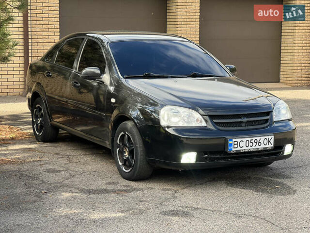 Черный Шевроле Лачетти, объемом двигателя 1.8 л и пробегом 248 тыс. км за 4250 $, фото 1 на Automoto.ua