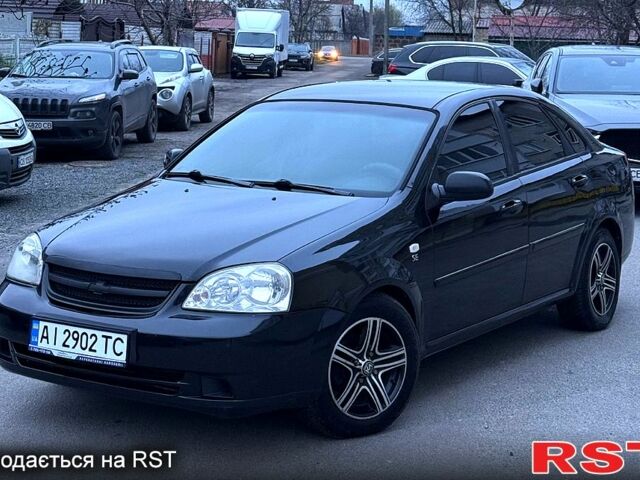 Черный Шевроле Лачетти, объемом двигателя 1.6 л и пробегом 233 тыс. км за 3750 $, фото 1 на Automoto.ua