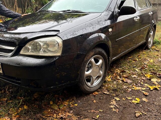 Черный Шевроле Лачетти, объемом двигателя 1.8 л и пробегом 250 тыс. км за 4200 $, фото 1 на Automoto.ua